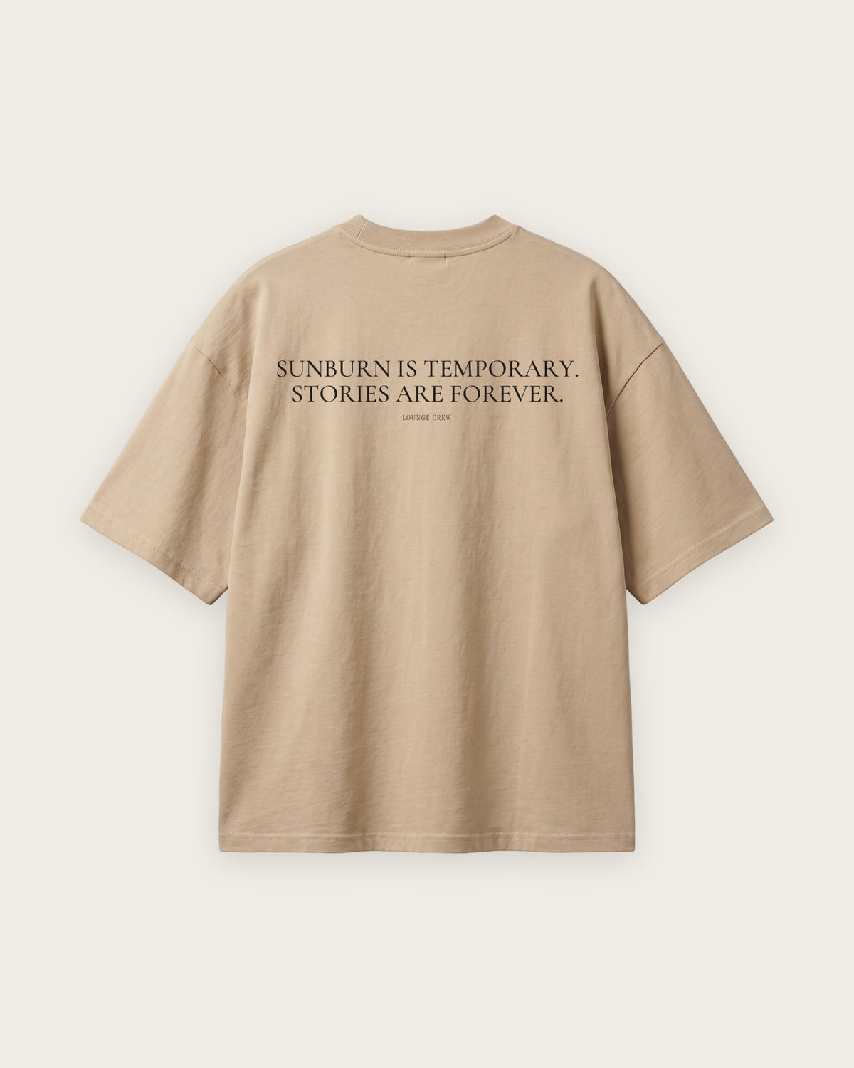 Camiseta Oversized “Sunburn Is Temporary, Stories Are Forever” — Areia