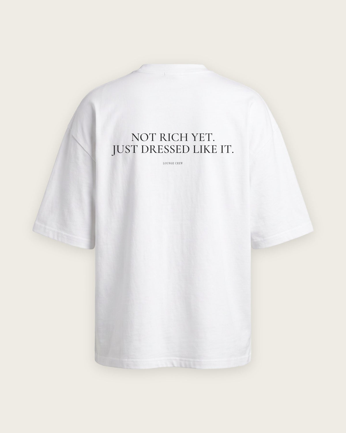 Camiseta Oversized “Not Rich Yet, Just Dressed Like It” — Branco
