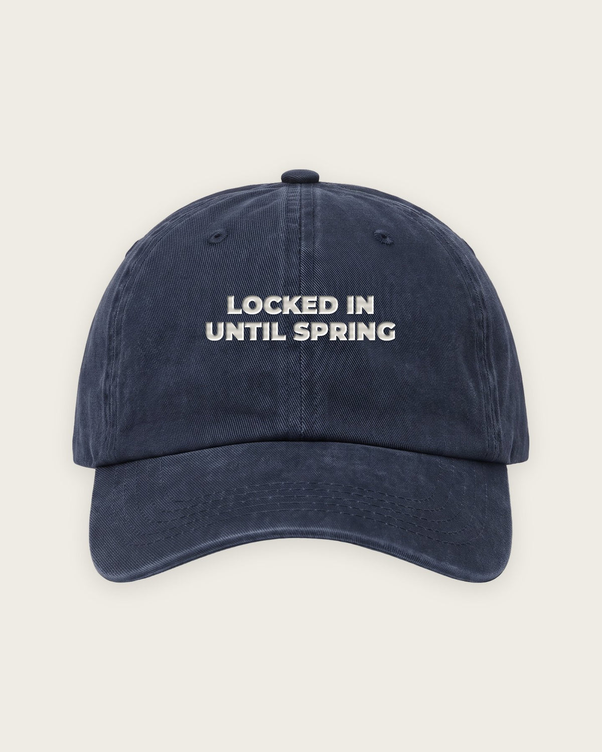 Boné Dad Hat “Locked In Until Spring” — Marinho