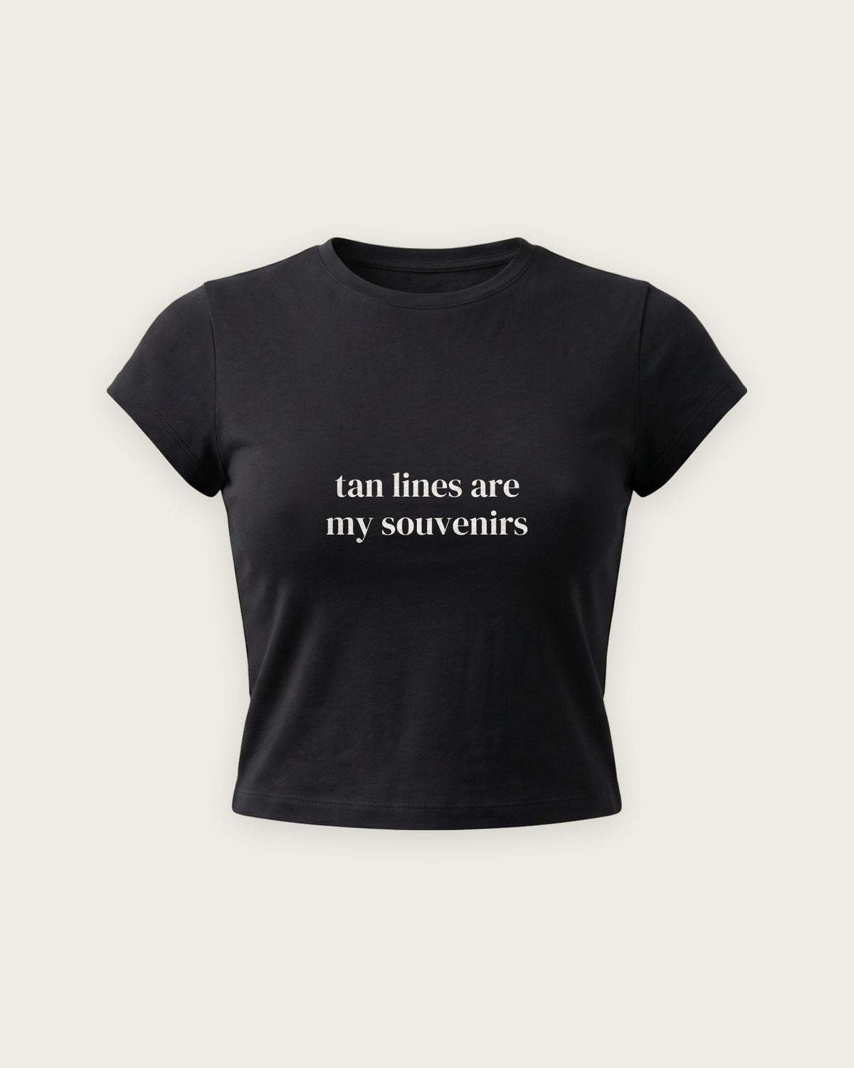 Baby Tee “Tan Lines Are My Souvenirs” — Preto
