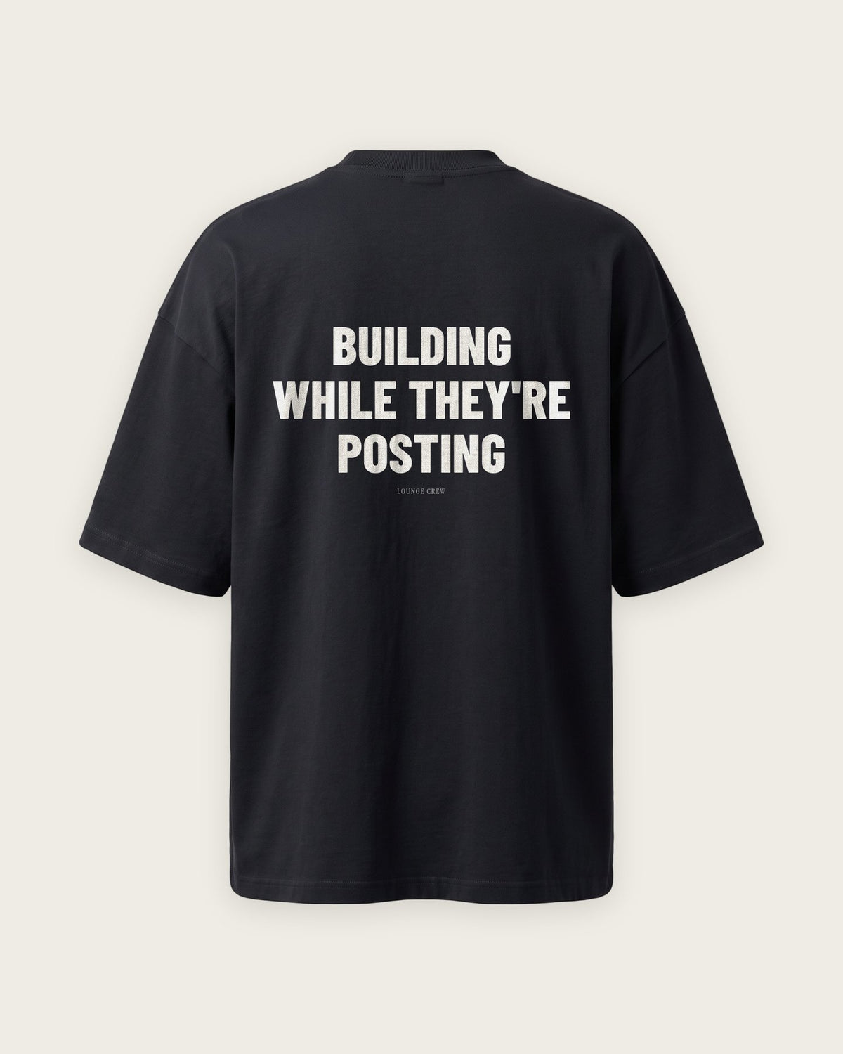 Camiseta Oversized “Building While They're Posting” — Preto