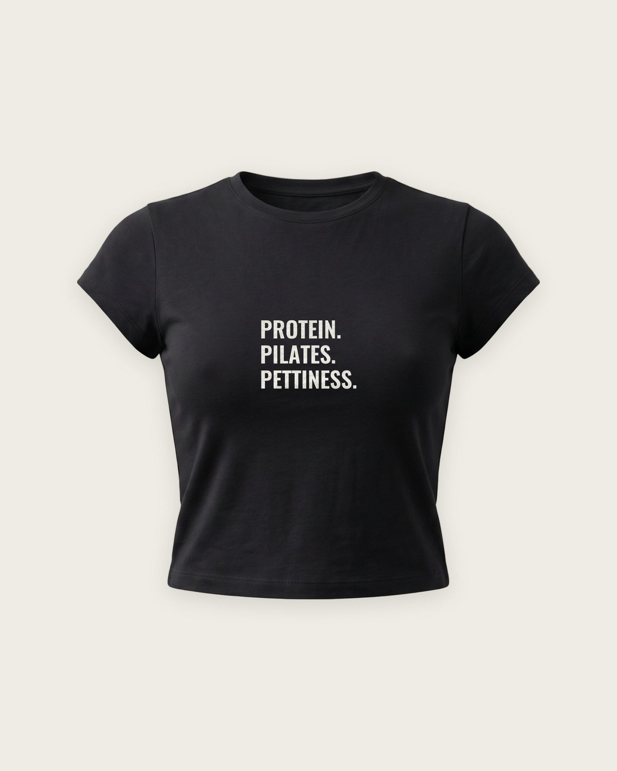 Baby Tee “Protein, Pilates, Pettiness” — Preto